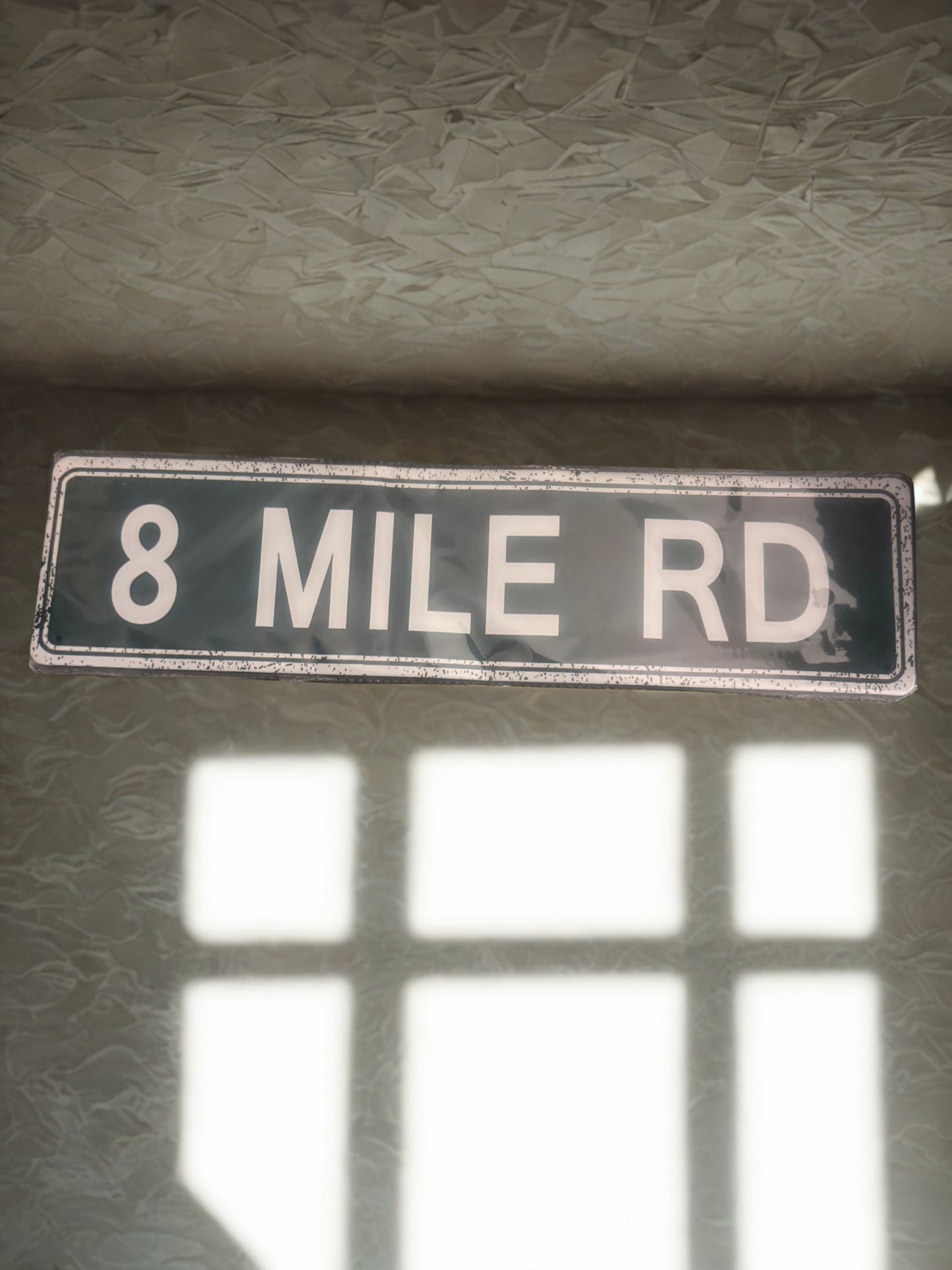 8 MILE Road sign